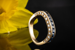 Gübelin Ring mit Saphir und seitlichen Brillanten in Gelbgold 750 Arbeit