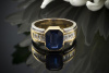 Farbintensiver Saphir Ring mit Baguette Diamanten in 750er Gold Bicolor Gelbgold Weißgold 