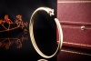 Panthère de Cartier Armreif Gelbgold 750 mit Onyx und Tsavorit Full Set 