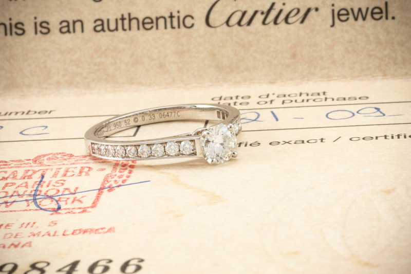 Cartier Solitär Ring 1895 0,33 Ct VS1 mit seitlichen Diamanten in Platin 