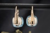 Pomellato Ohrringe Ohrstecker Nudo Classic mit Blautopas hell 750er Gold 