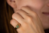 Ring mit Smaragd und 12 kleine Diamanten in 585er Gelbgold 