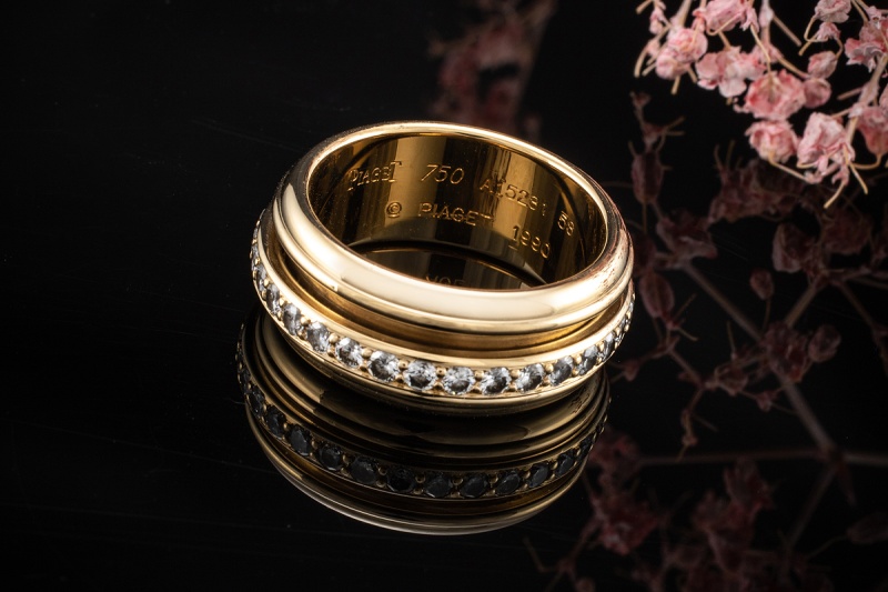 Piaget Ring Possession Drehring mit Brillanten in 750er Gelbgold Gr. 58 